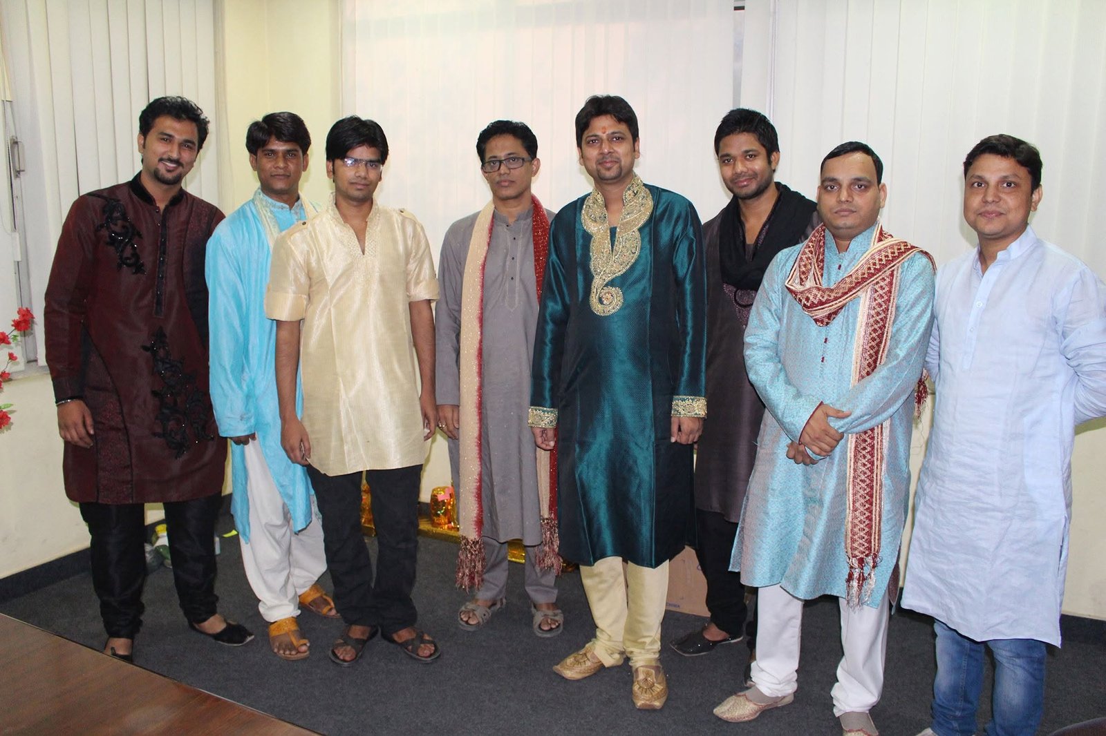 Manish with colleagues at a team celebration